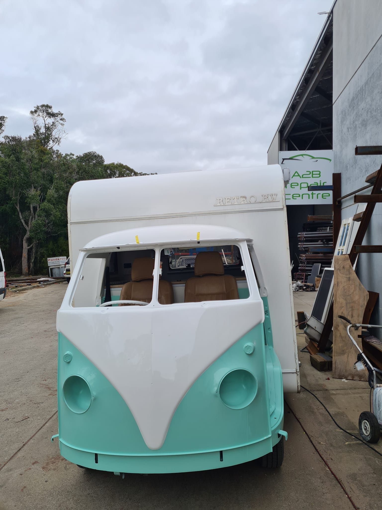 Mint-and-white Vintage Van Parked — A2B Smash Repairs in Berkeley Vale, NSW