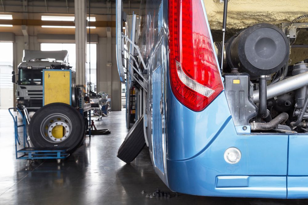 Blue Bus in Auto Repair Shop — A2B Smash Repairs in Berkeley Vale, NSW