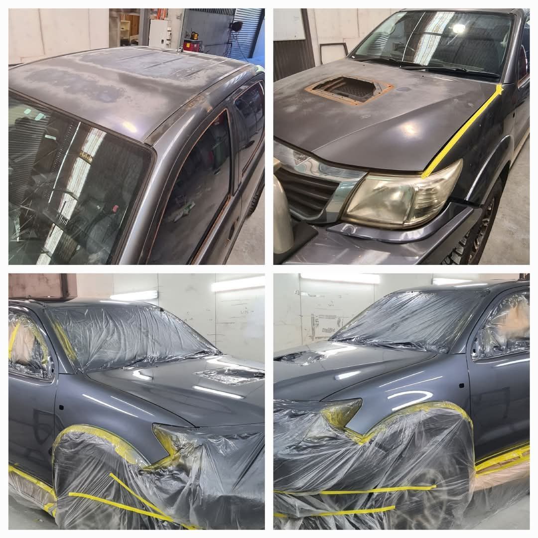 Gray car in a body shop, sanded and masked for paint repair — A2B Smash Repairs in Berkeley Vale, NSW