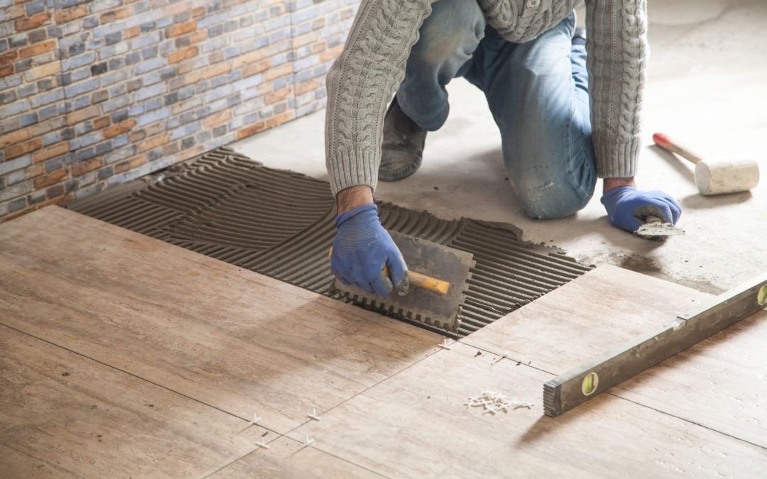 A house is being built with a lot of wood and windows.