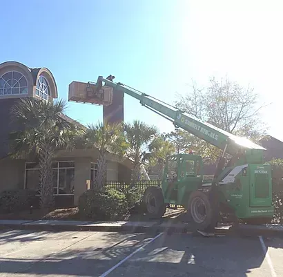 Repairman Repairing Chimney - Calabash, NC - Roof Doctor Of The Carolinas Inc.
