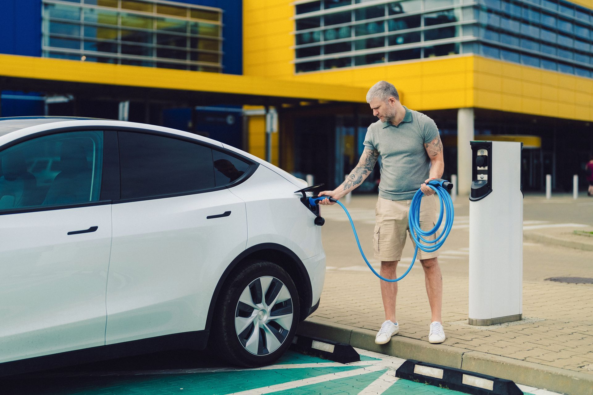 A house with a garage and solar panels on the roof.
