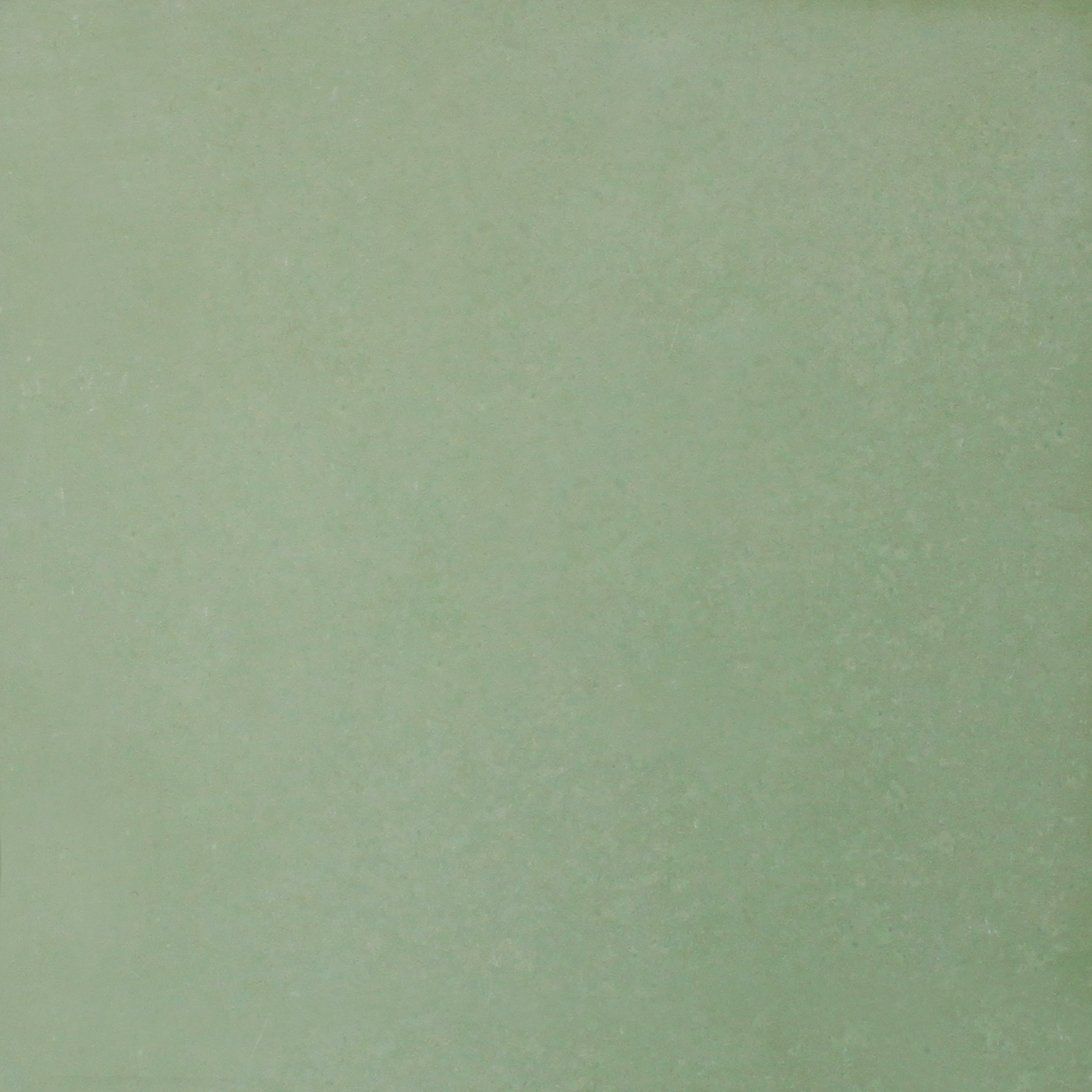 Un primer plano de un trozo de papel verde.