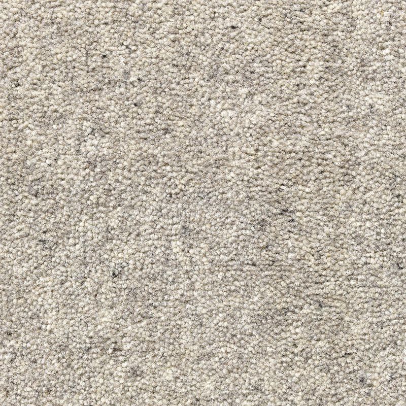 Un primer plano de una textura de alfombra gris.