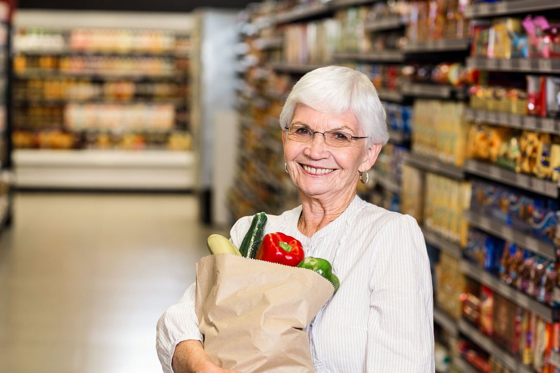 Senior woman grocery shopping