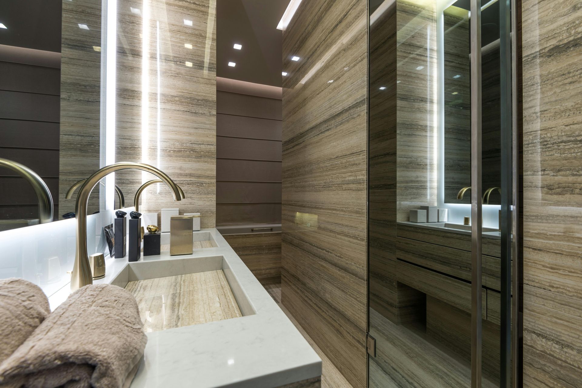 A bathroom with two sinks and a mirror.