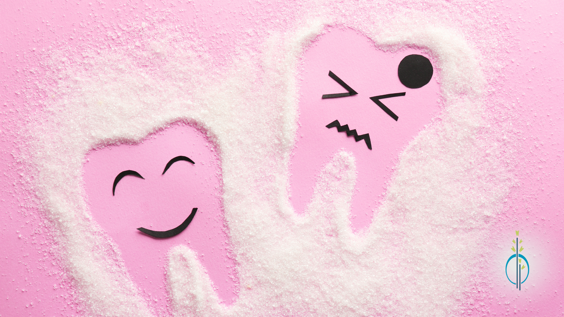 Two pink teeth with smiley faces drawn on them are sitting on a pink surface.