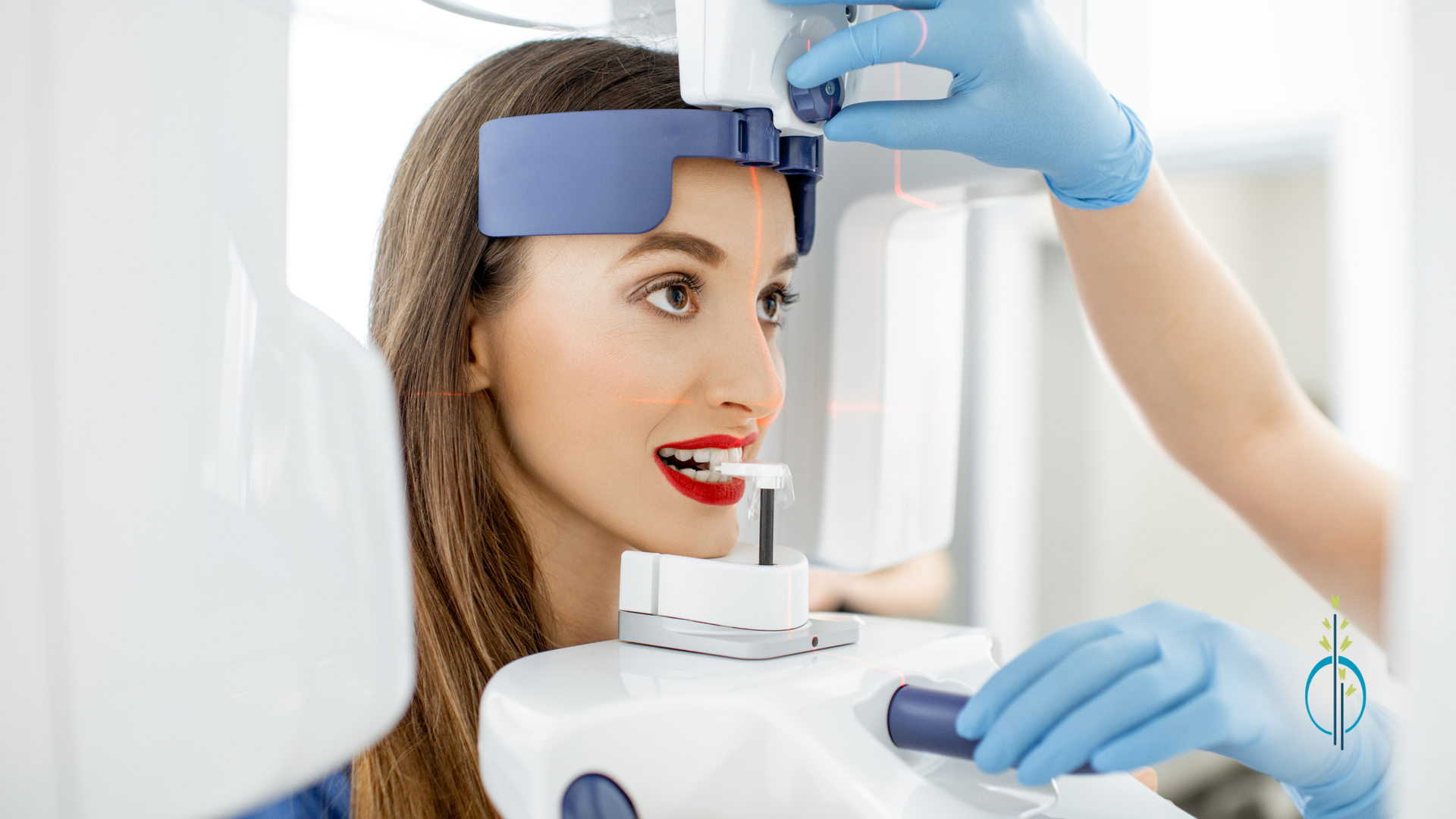 A woman is getting an x-ray of her teeth in a dental office.