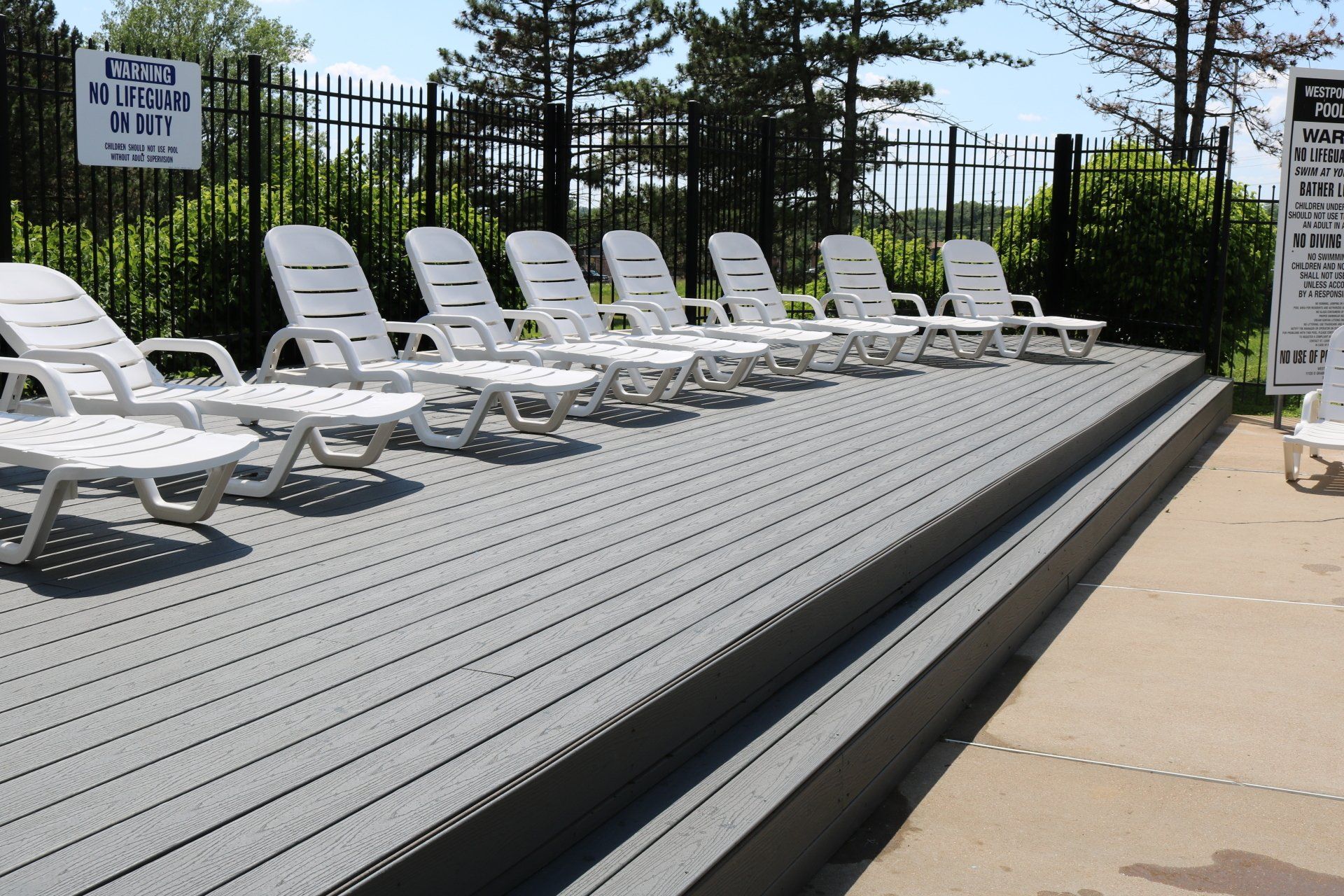 Westport Crossing Apartments deck with layout chairs.