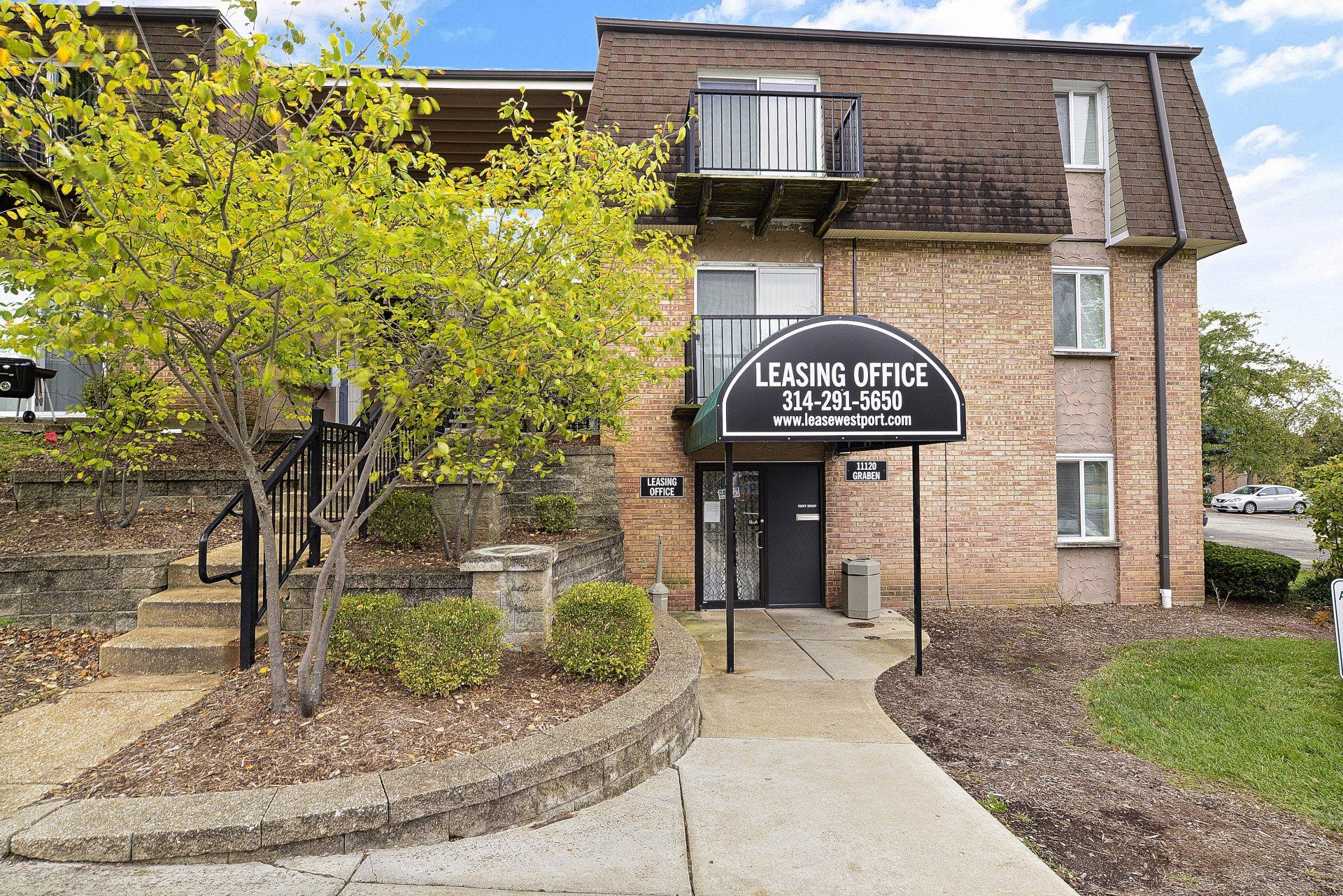 Exterior of Westport Crossing Apartments entrance to leasing office.