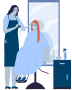Hairdresser cutting a client's red hair in a salon. The client is seated in front of a mirror.