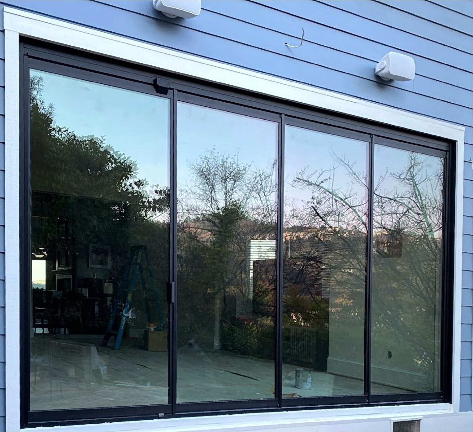 A large window on the side of a house