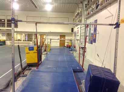 Gym Unstructor — Gymnastic Facility With Blue Mat And Pole in Greensburg, PA