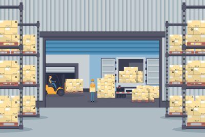 Warehouse interior with boxes on shelves and forklift, loading dock with worker.