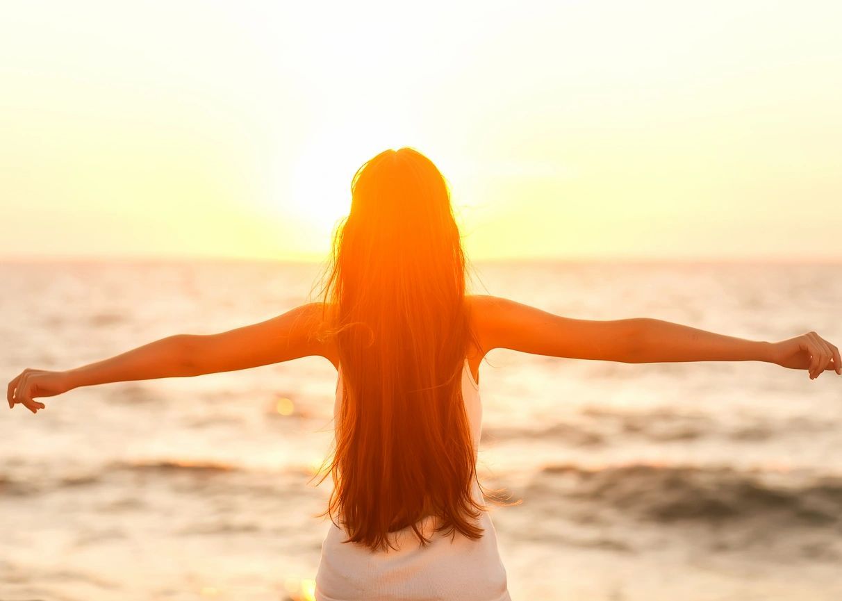 Woman Enjoying The Waves— Jacksonville, FL — Fulton Gibbs Wellness