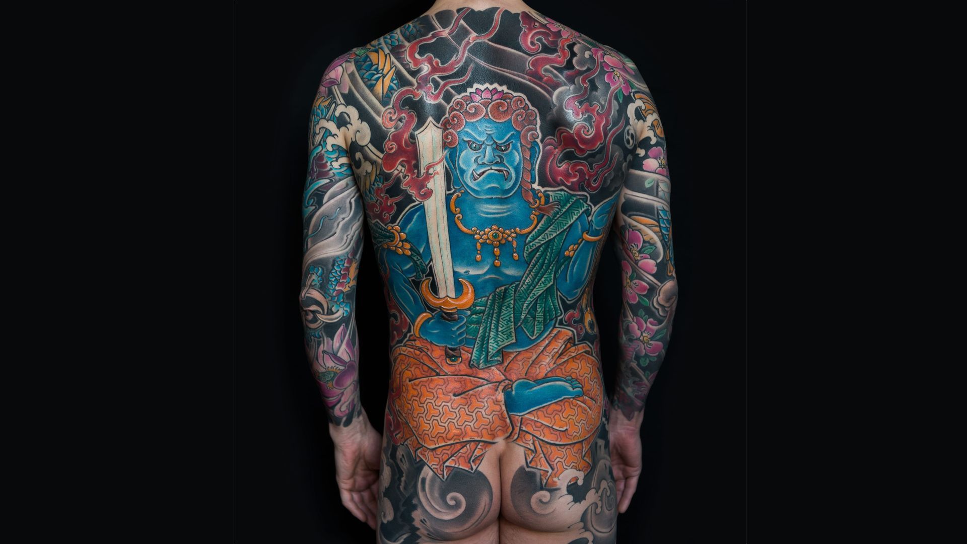 Full back tattoo showing Fudo Myoo done at Bardadim Tattoo studio.