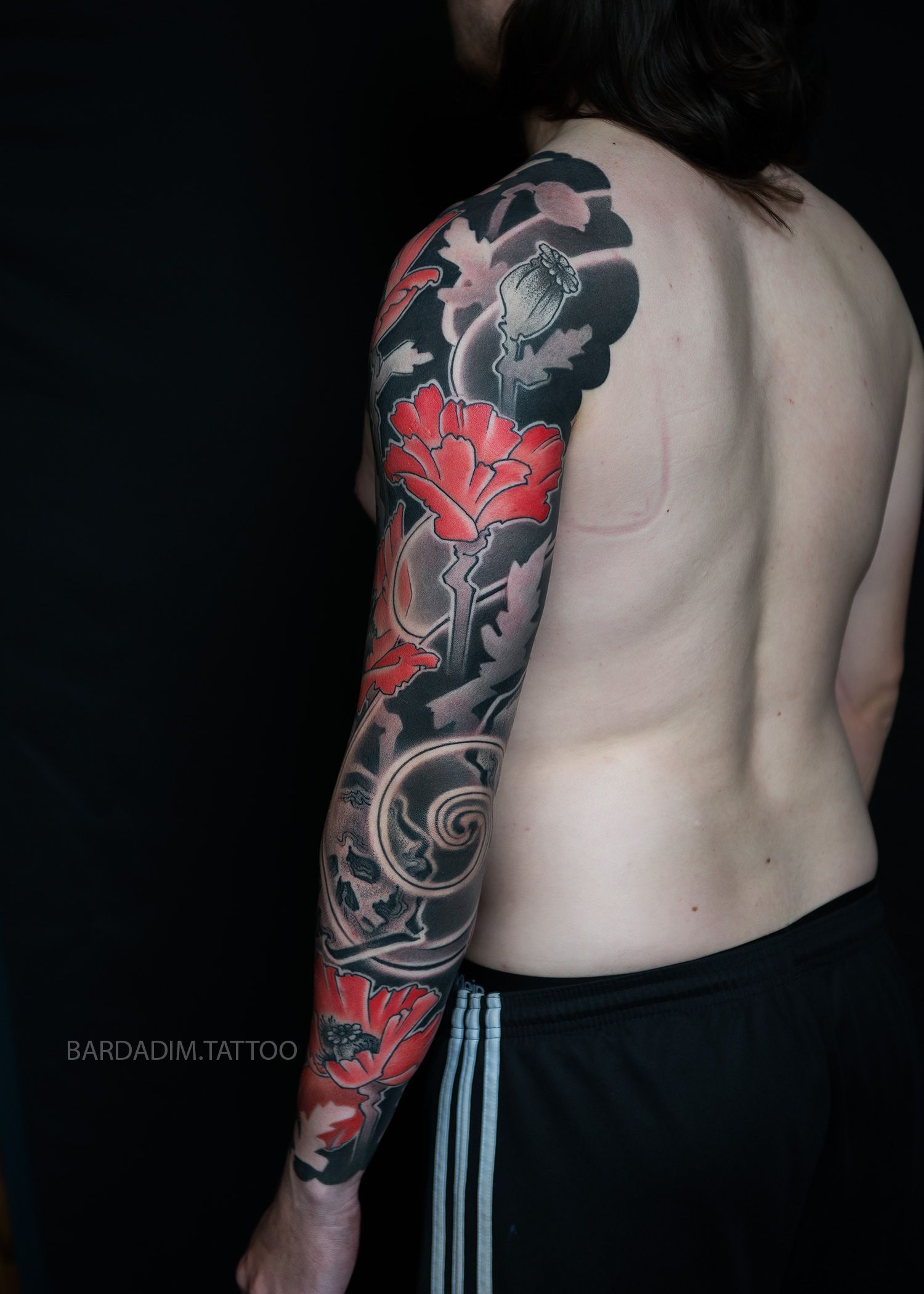 poppy flowers and skulls tattoo sleeve by George Bardadim