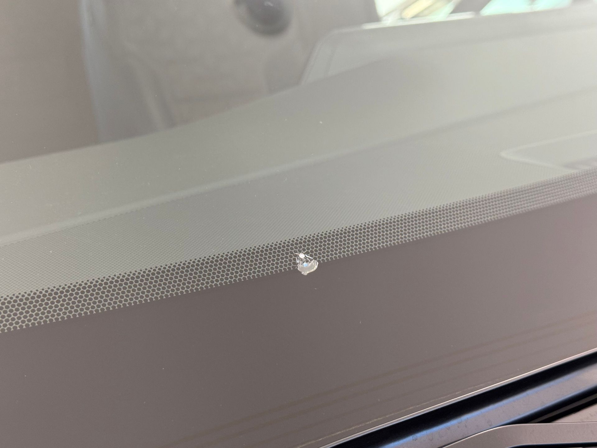 Before windshield repair in Woodstock, GA