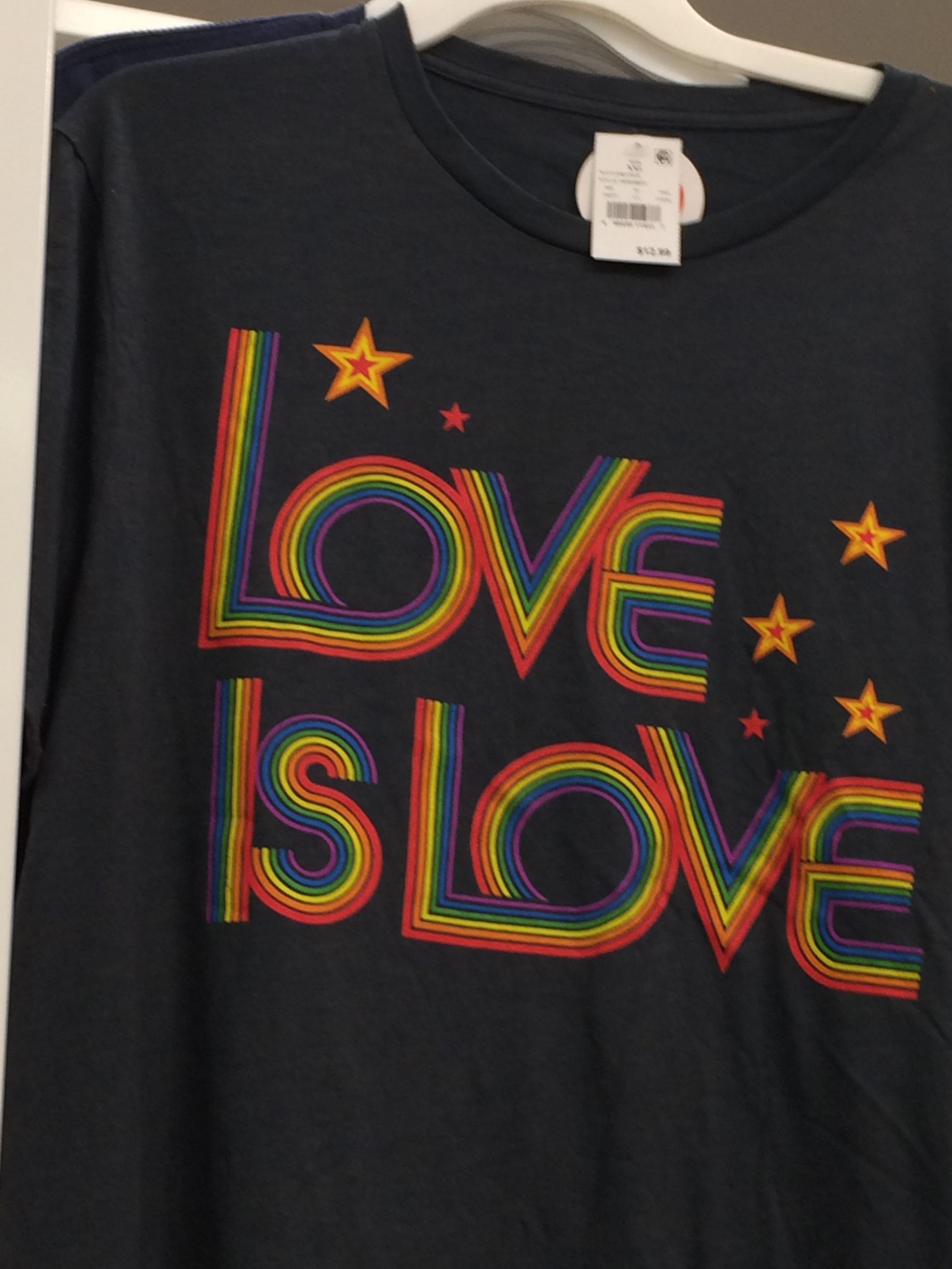 A dark blue long-sleeve t-shirt with the text 