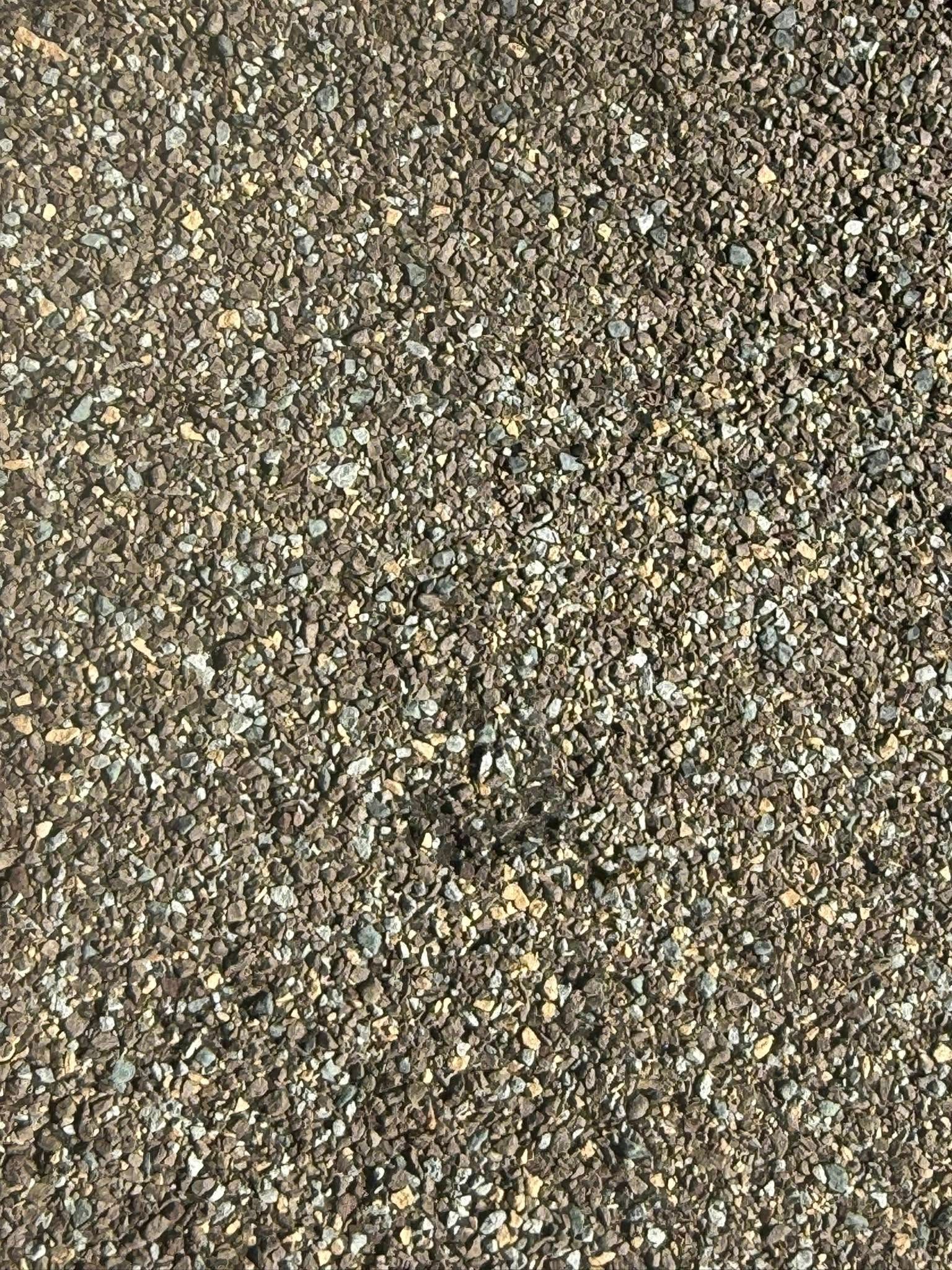 A close up of a pile of gravel.