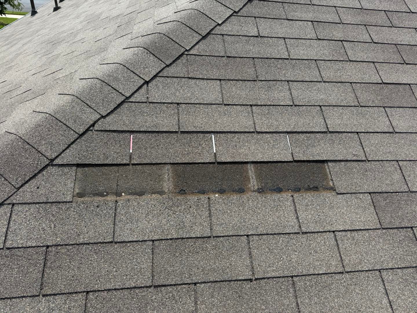A close up of a roof with a hole in it.
