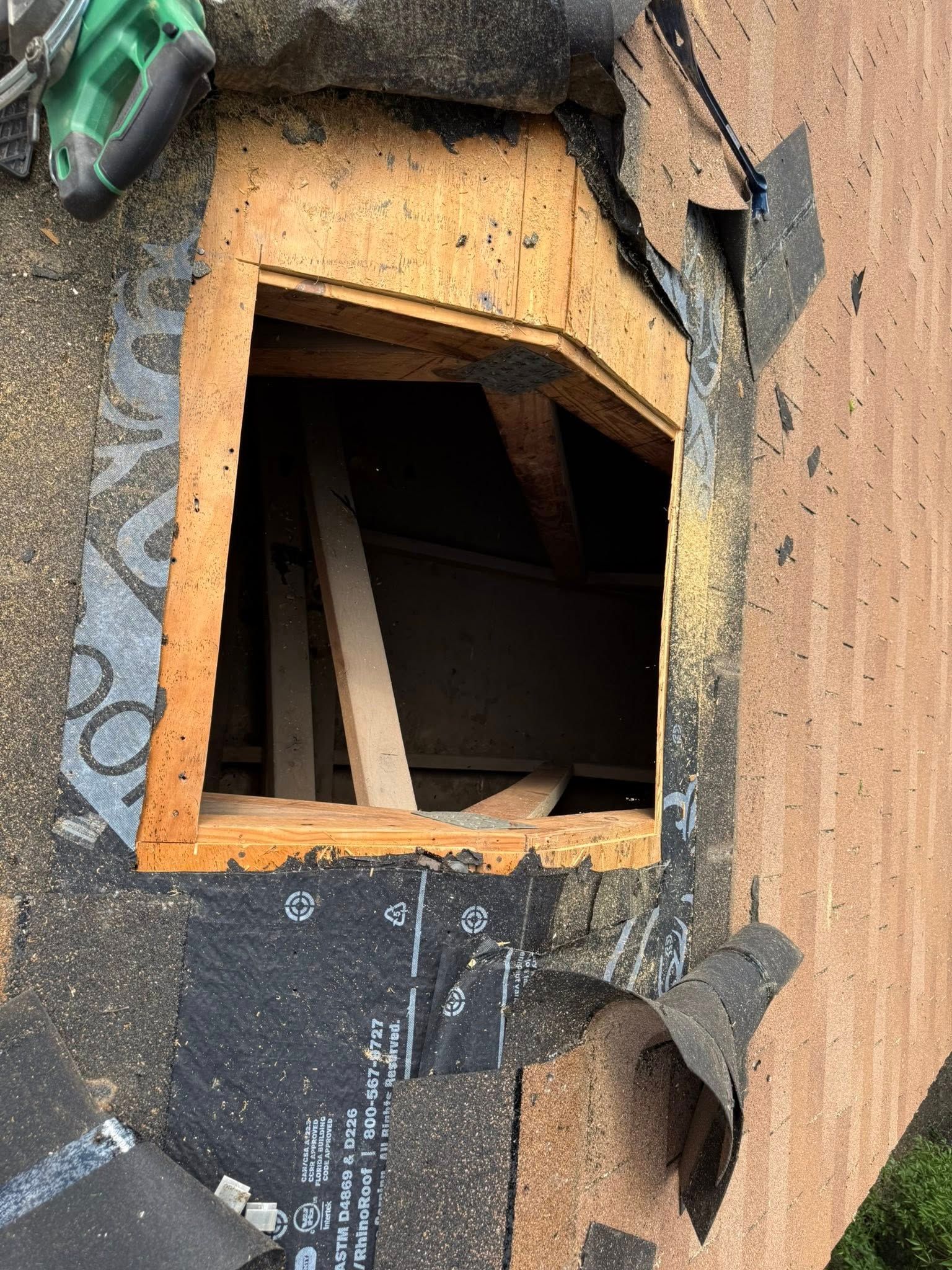 A hole in the roof of a building with a hole in it.