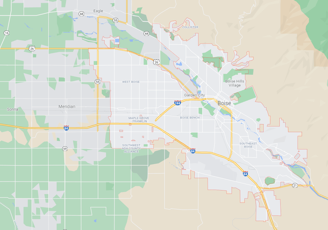 A map of a city with a lot of roads and trees.