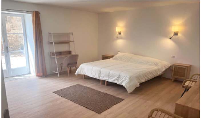 One of the bedrooms in a flat at the Gite