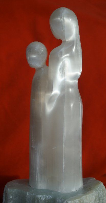 foster mother and child; selenite sculpture by Gera ter Meulen