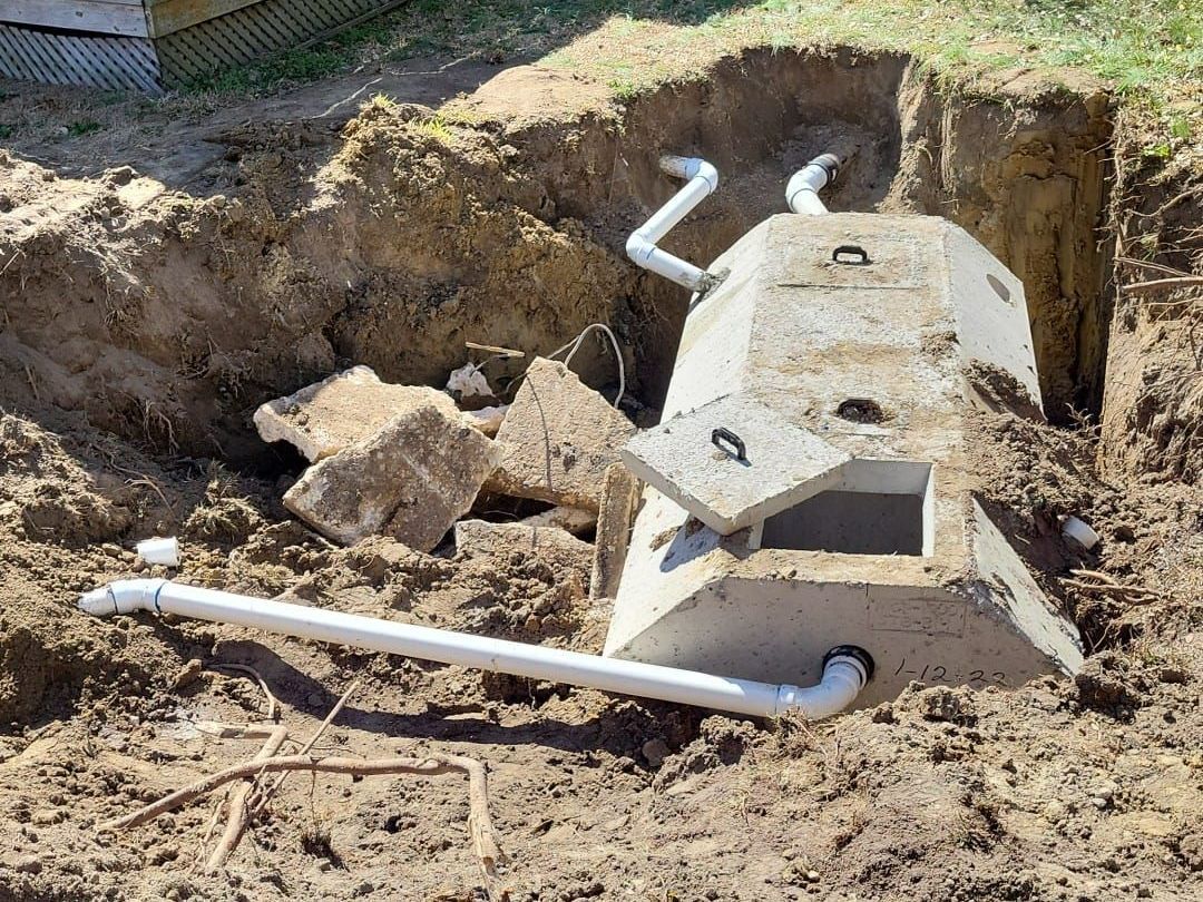 a concrete structure in the dirt