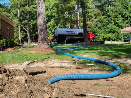 a septic tank is being pumped by a septic company