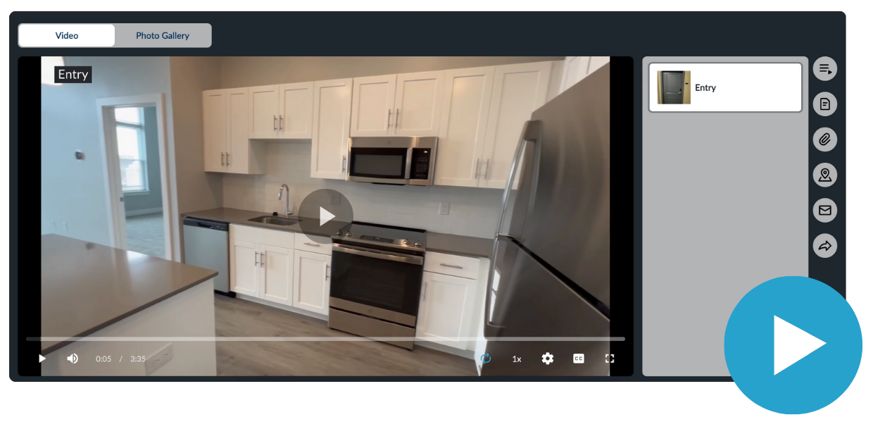 A video of a kitchen with white cabinets and stainless steel appliances.