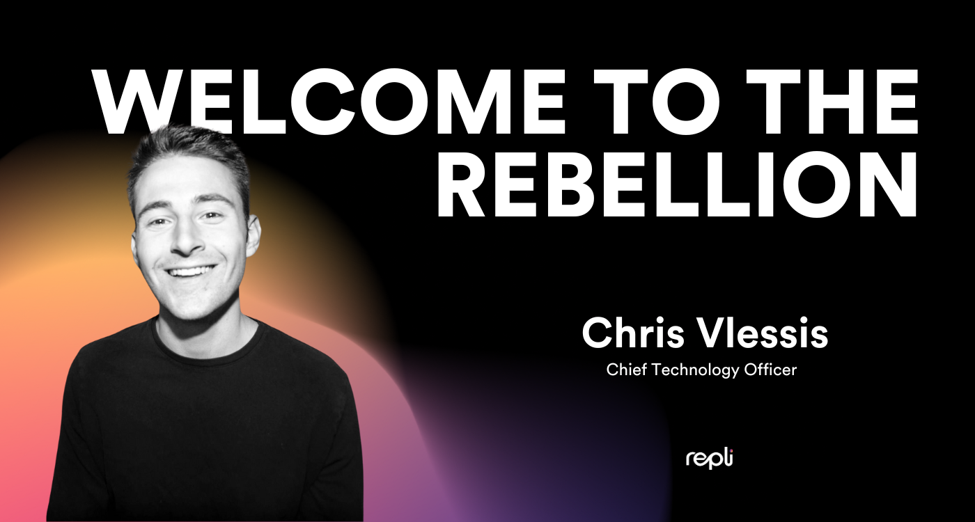 A man is standing in front of a sign that says welcome to the rebellion.