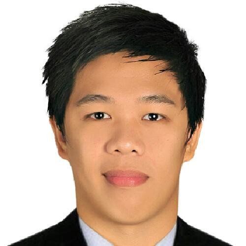 A close up of a man 's face wearing a suit and tie