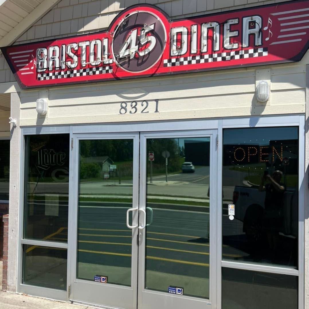 Bristol 45 diner has a red sign above the doors