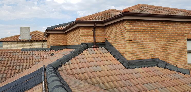 Barrel-tile roof with drainage showing the roof waterproofing service 
