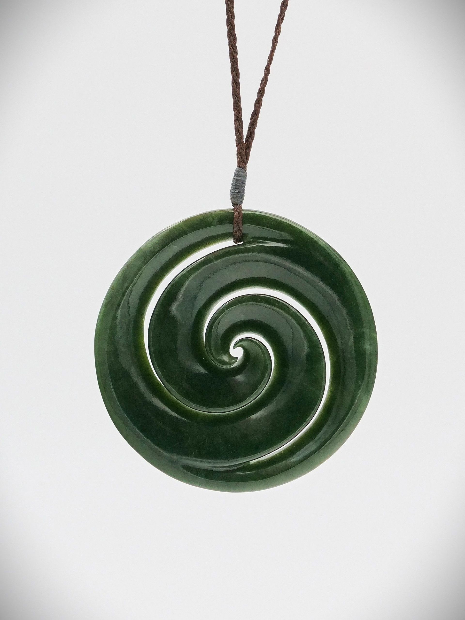 double koru greenstone pendant