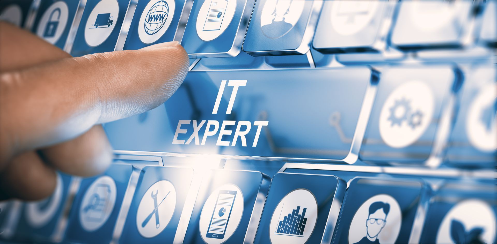 Finger pressing “IT Expert” key on digital interface keyboard with tech icons.