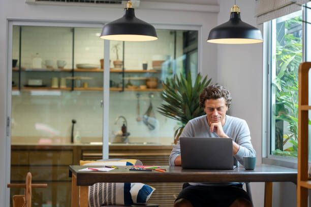 Man working remotely on a laptop