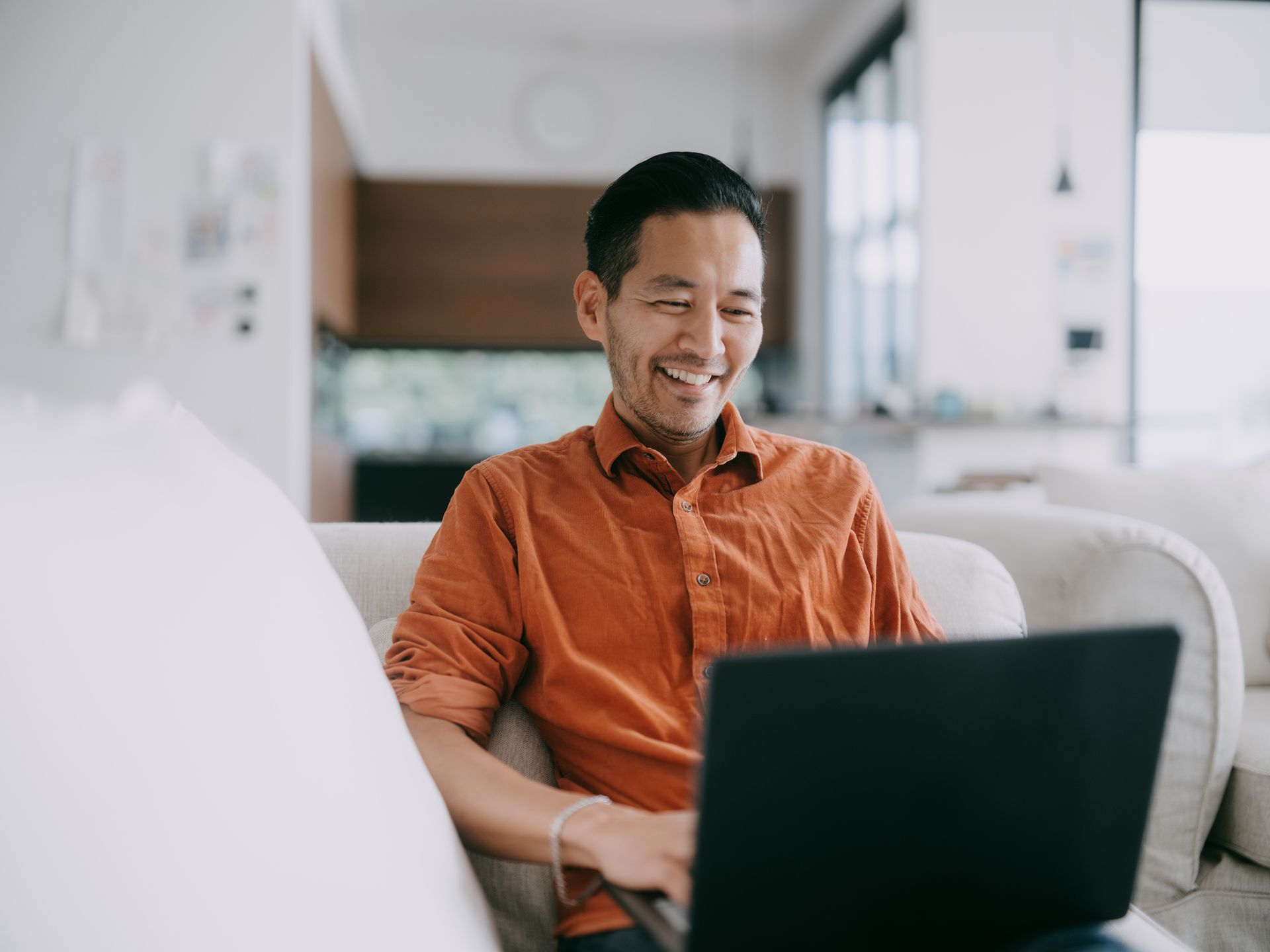 Man at home enjoying some time at a secured computer