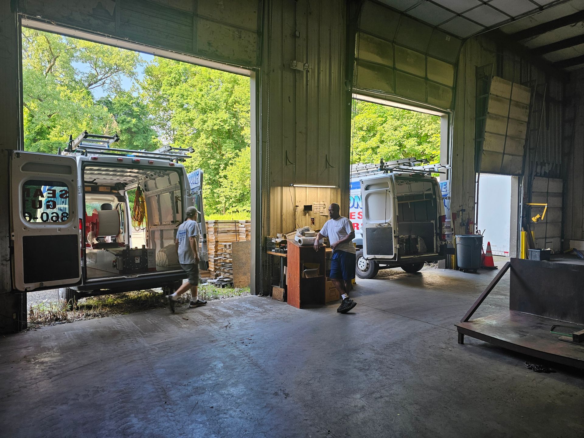 A close up of a white gutter on the side of a house.