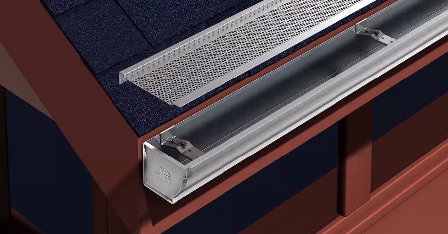 A close up of a metal gutter on a roof.