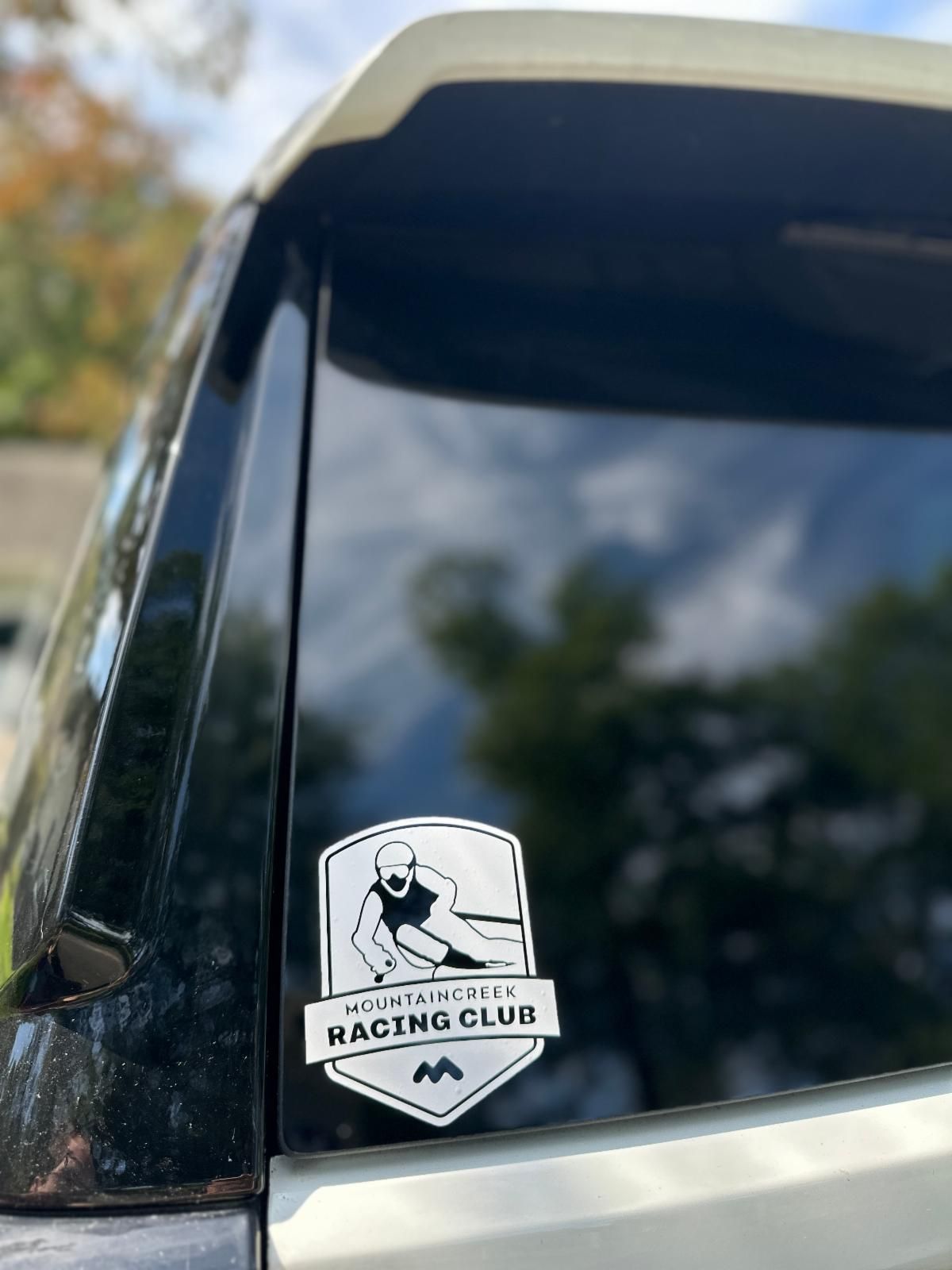 Maroon t-shirt with a ski club graphic: 