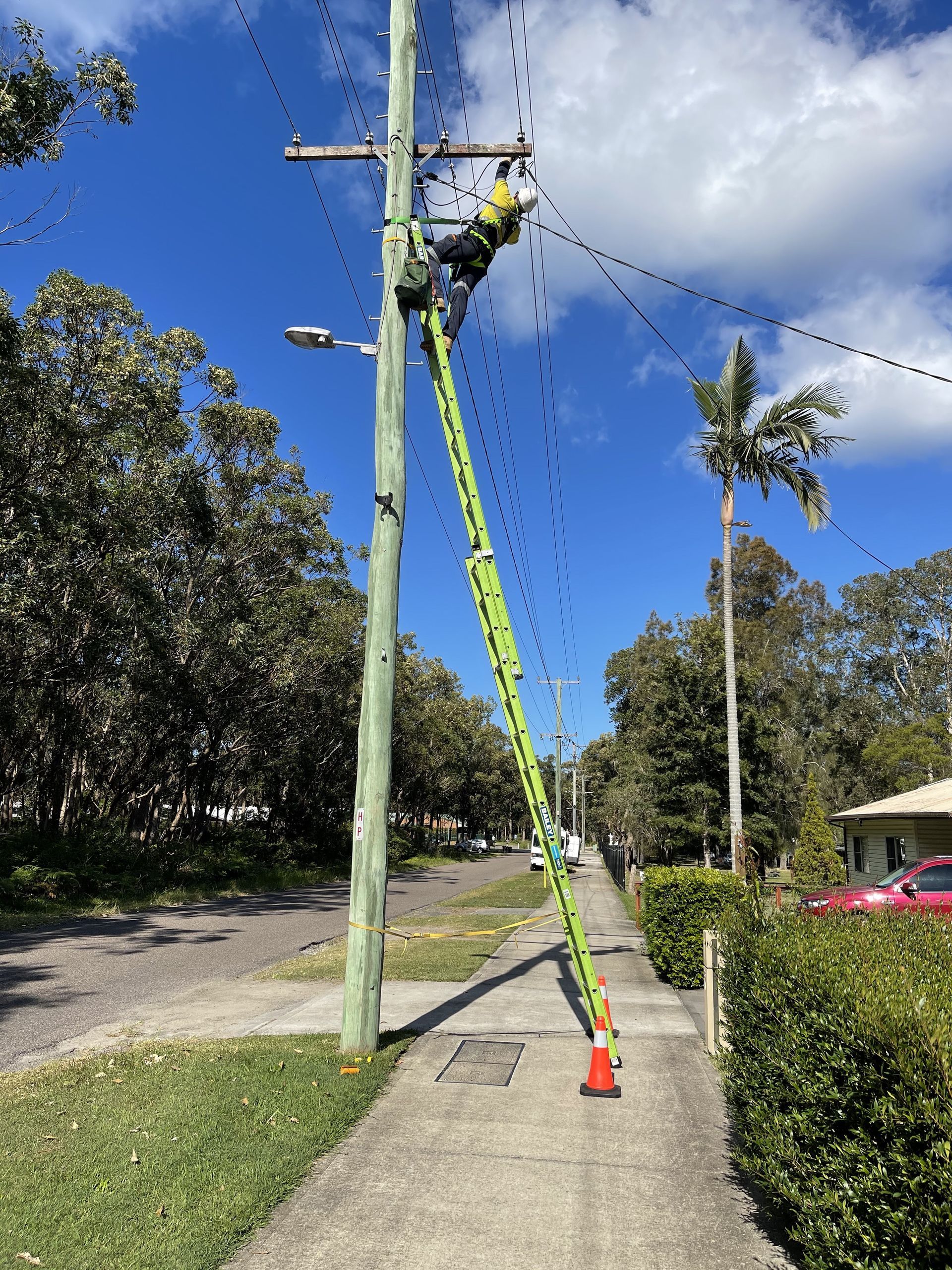 Electrician Installing Alarm System — Level 2 Electrician in Toukley, NSW