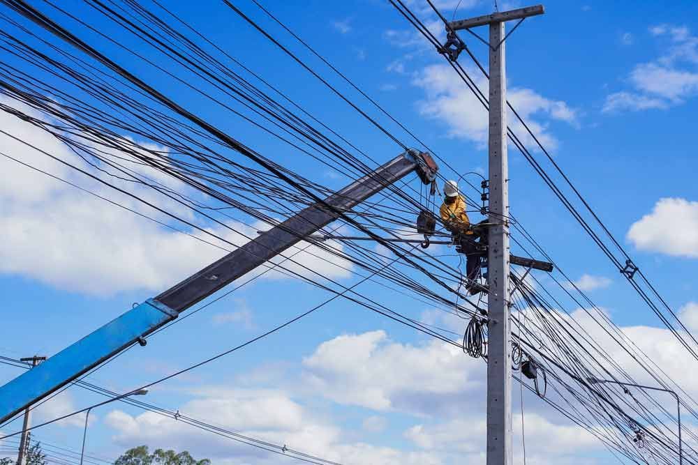 Electrician Working on Electric Pole — Level 2 Electrician in Toukley, NSW