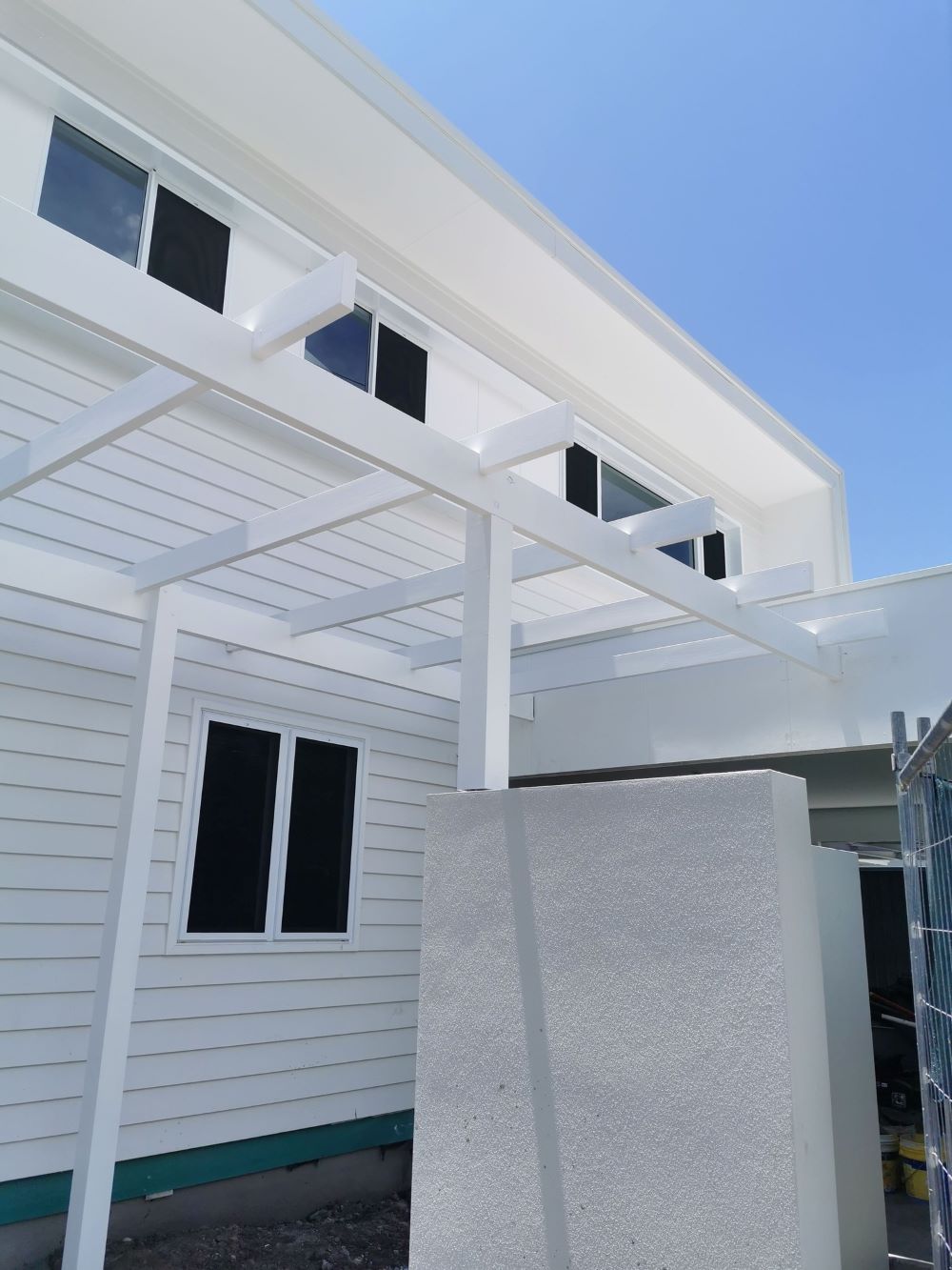 A White House With a Pergola — Eva Professional Painting in Robina, QLD