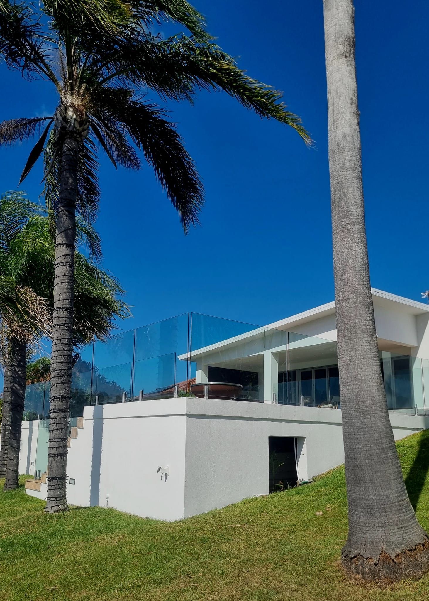 Outside a House with a Pool— Eva Professional Painting in Robina, QLD