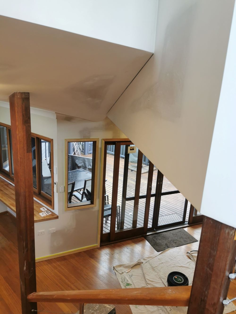 A View of a House From the Top of a Staircase — Eva Professional Painting in Robina, QLD