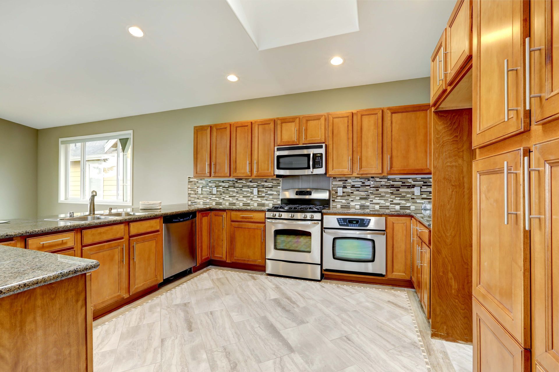 Luxury Kitchen Room With Bright Brown Cabinets