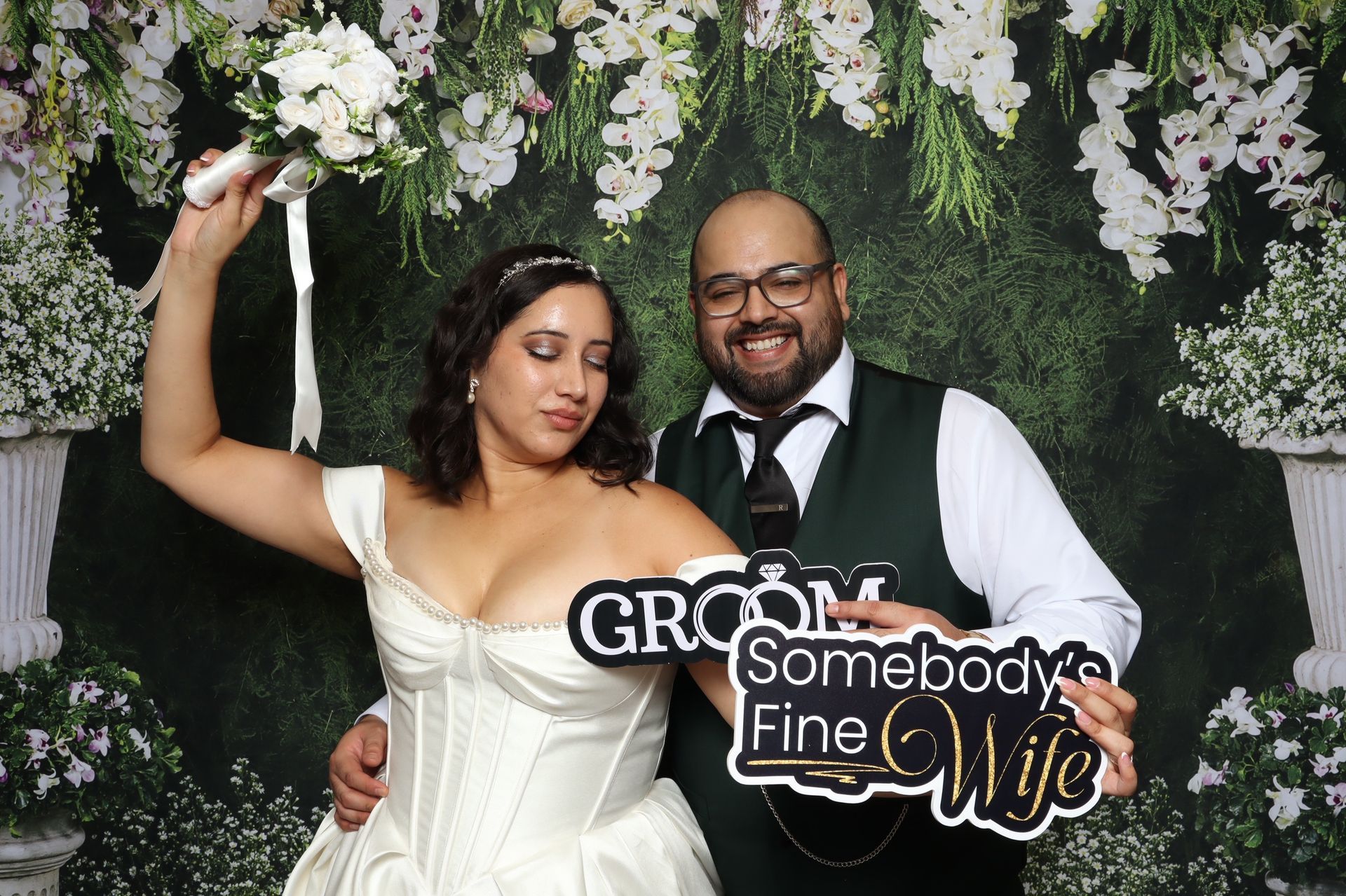 Wedding photo booth backdrop styled for romantic reception